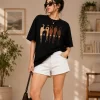 Women's oversized black graphic printed cotton T-shirt front view