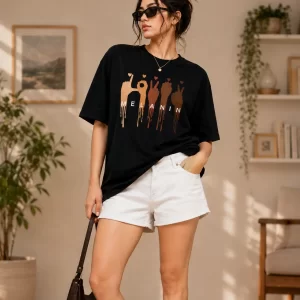Women's oversized black graphic printed cotton T-shirt front view