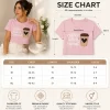 Woman wearing pink Coffee Teach Repeat graphic t-shirt with coffee cup design, ideal teacher gift tee