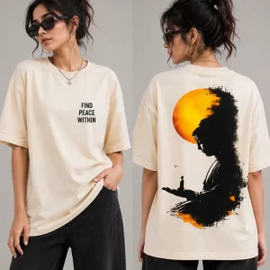 Front view: "Woman wearing beige oversized t-shirt with 'Find Peace Within' text print, front view" Back view: "Woman wearing beige oversized t-shirt with Buddha silhouette sunset graphic print on back"