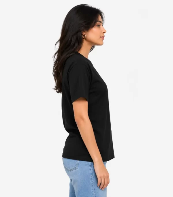 Woman wearing classic black cotton t-shirt with blue denim jeans, casual everyday outfit