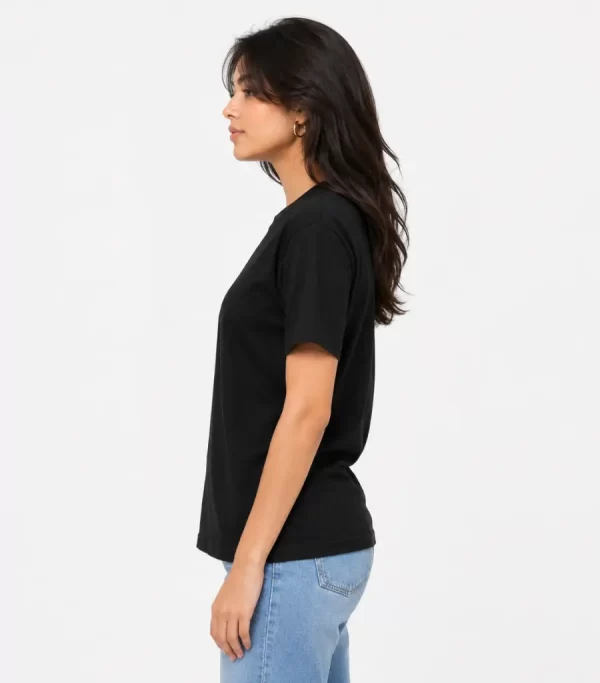 Woman wearing classic black cotton t-shirt with blue denim jeans, casual everyday outfit