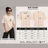 Front view: "Woman wearing beige oversized t-shirt with 'Find Peace Within' text print, front view" Back view: "Woman wearing beige oversized t-shirt with Buddha silhouette sunset graphic print on back"