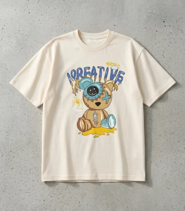 Woman wearing cream oversized t-shirt with Creative Smile teddy bear streetwear graphic print