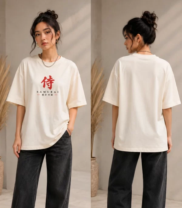 Woman wearing beige oversized Samurai graphic t-shirt with red Japanese kanji print, paired with black wide-leg jeans front and back view