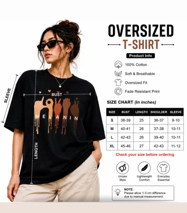 Woman wearing oversized black graphic T-shirt with white shorts