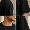 man wearing black oversized Kakashi anime t-shirt